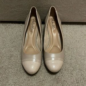 Size 9 nude color Abella close toed one inch heels.
